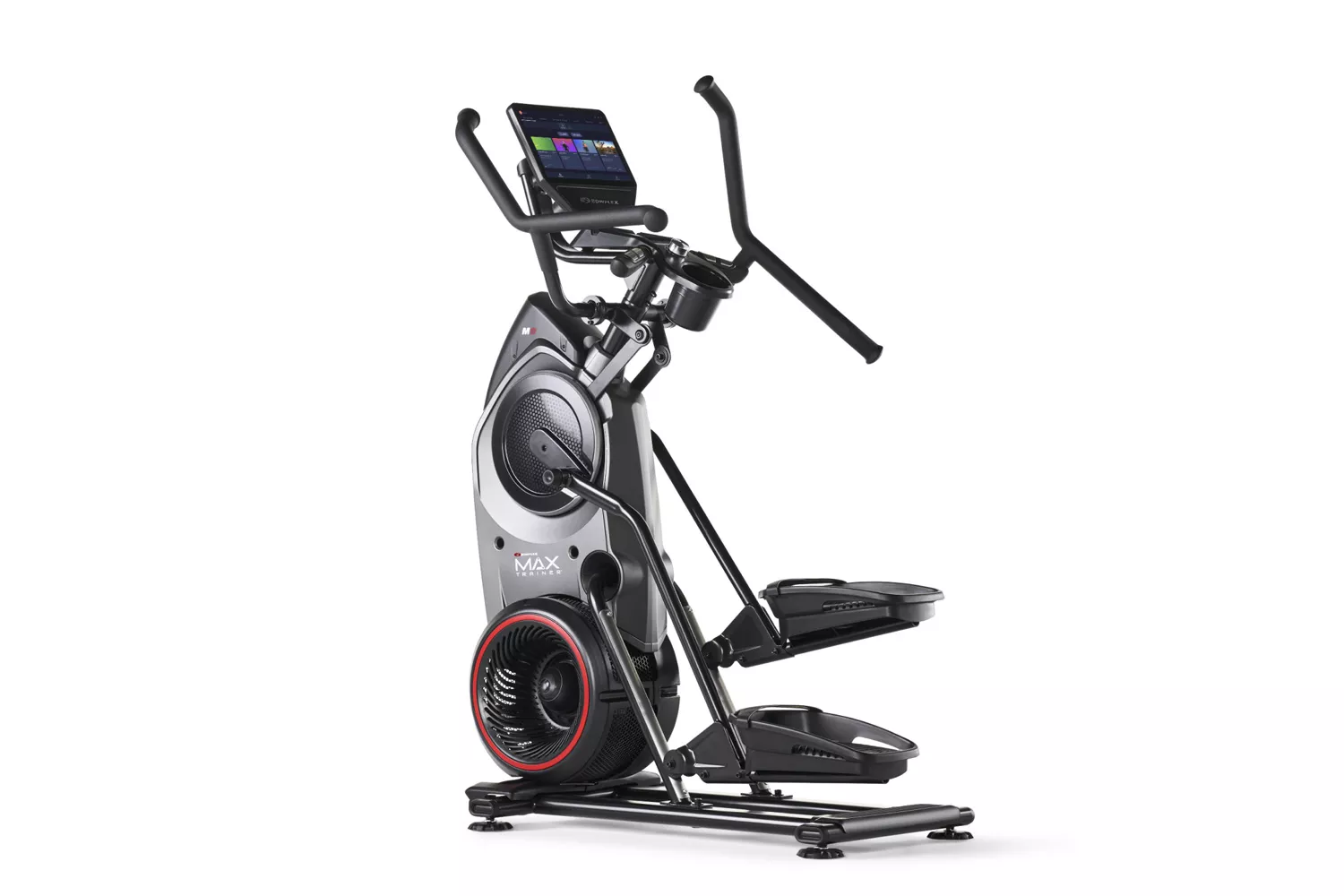 A BowFlex Max Trainer M9 with an active touchscreen display in a studio setting.