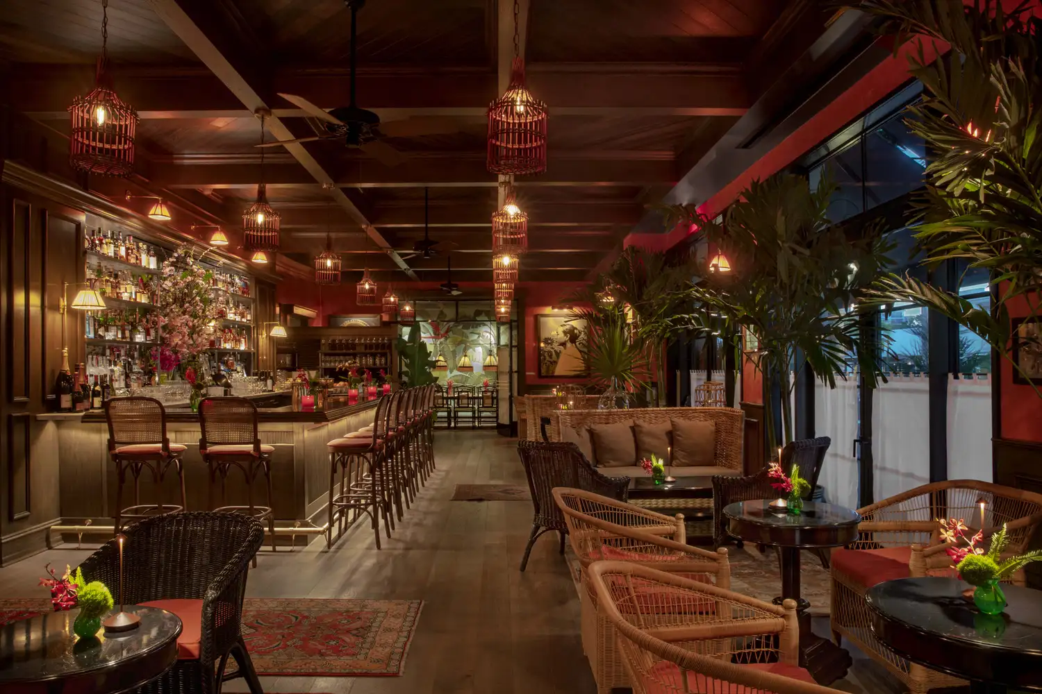 Upscale interior of Le Colonial restaurant with ornate lighting and a stylish bar area.