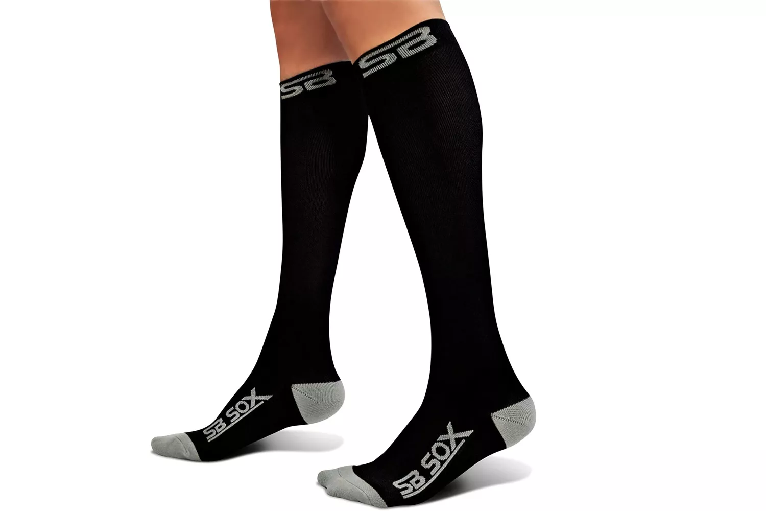 Front view of SB SOX compression socks on a tester.